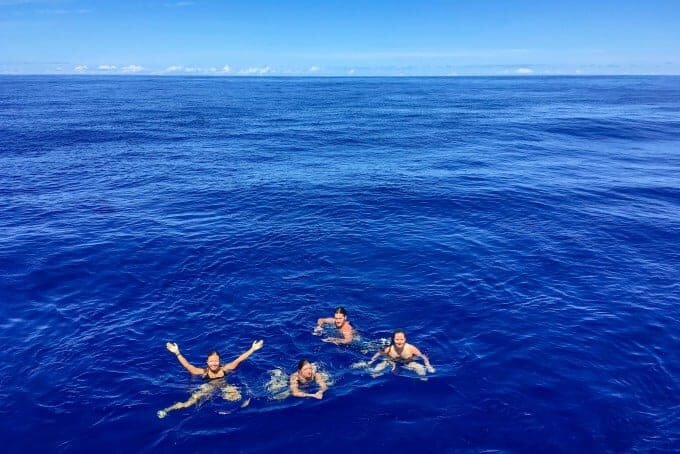 yacht crew swimming in the middle of the Atlantic Ocean
